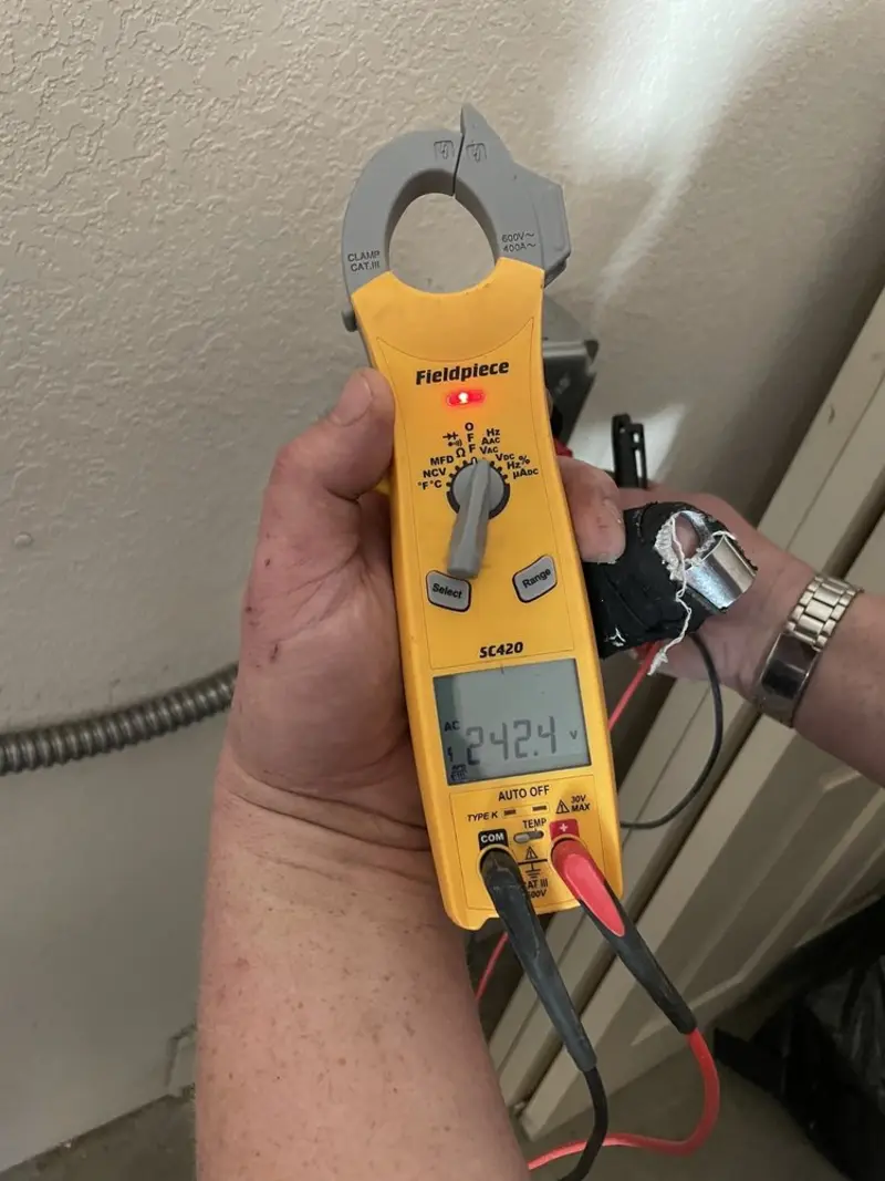 Voltage testing with clamp meter during Aluminum Wiring Replacement in Timberlake